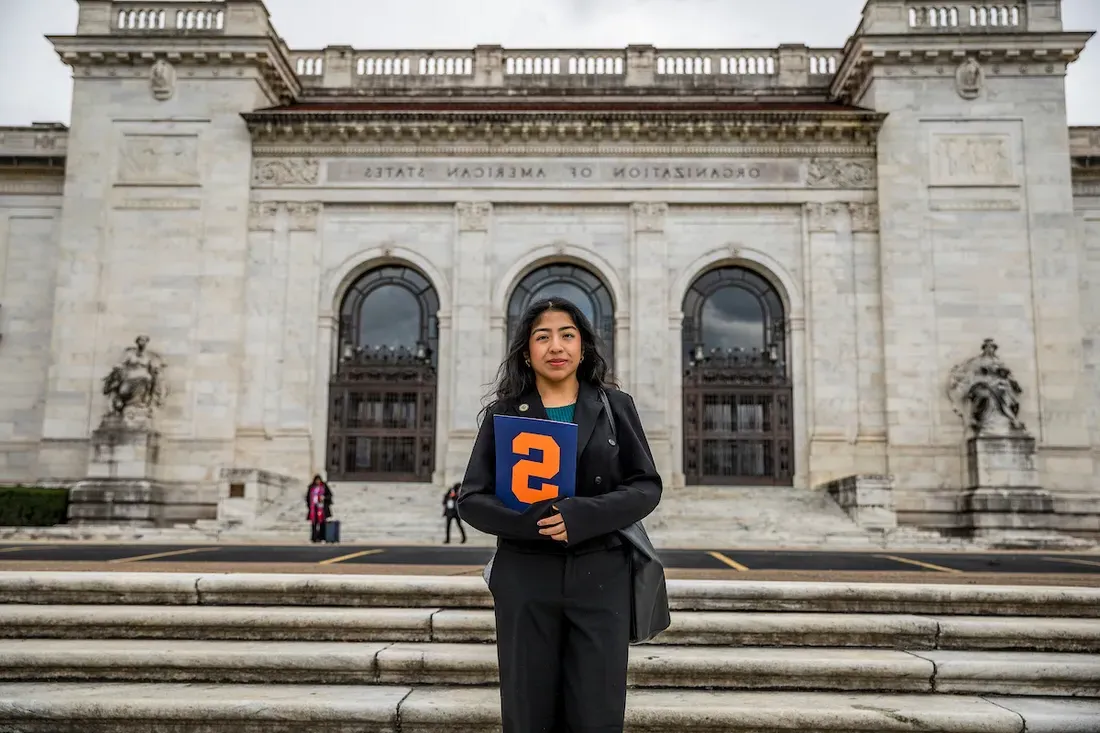 Student Xenia Zolano-Doroteo ’25 standing and smiling in Washington D.C.